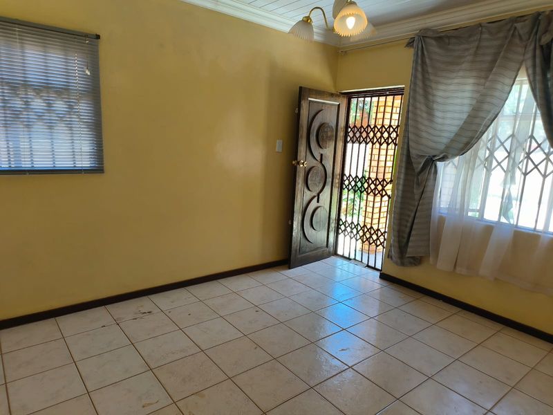 Three Bedroom Family Home For Sale in Thamaga Street, Jouberton - Photo 4