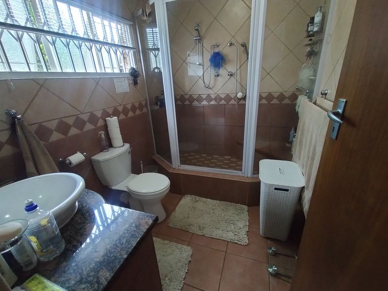 Neat and Spacious Living in a Tranquil Pretoria North Setting - Photo 10