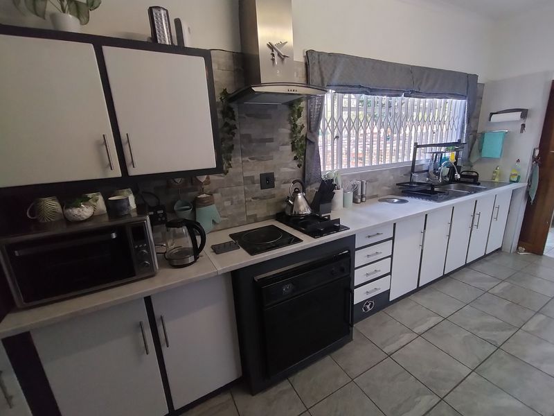 Neat and Spacious Living in a Tranquil Pretoria North Setting - Photo 6