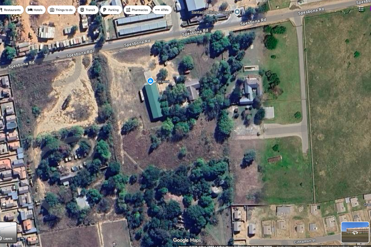 Aerial view of the farm property showing existing structures, access roads, and surrounding land layout.