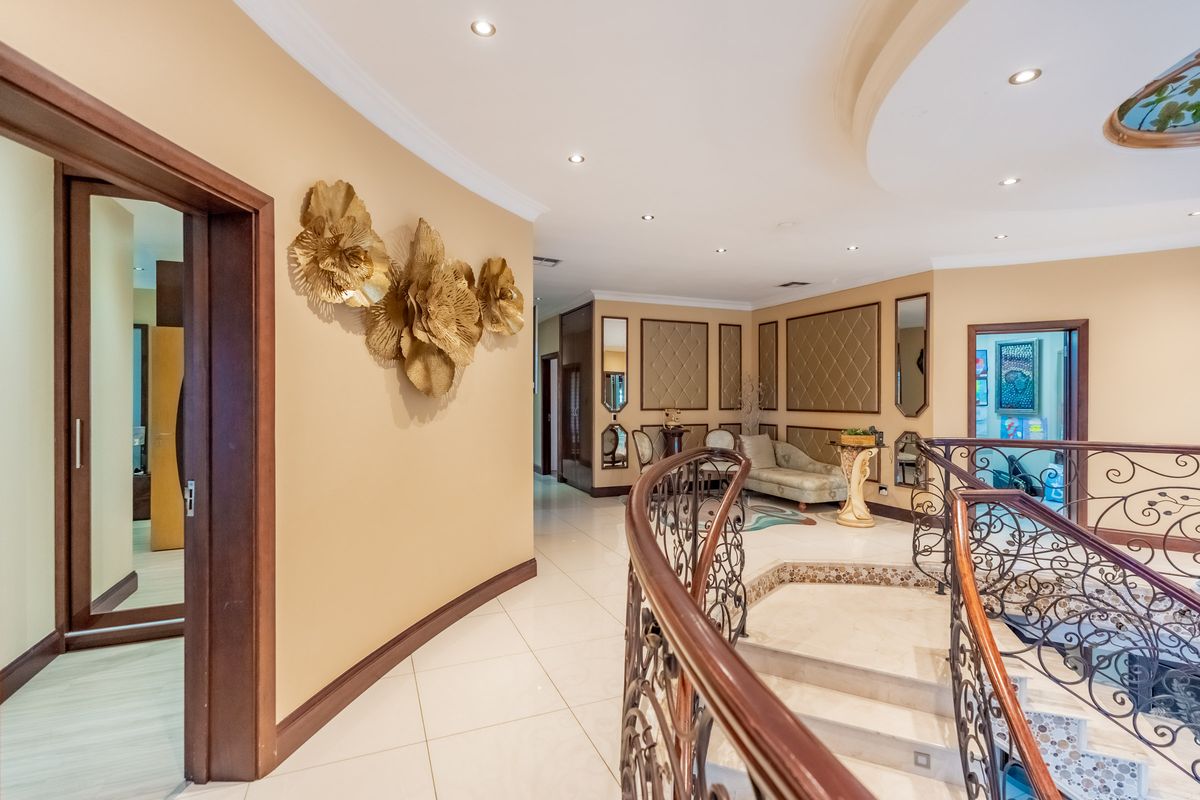 A CROWN JEWEL MANSION AWAITS ITS NEW ROYALTY! - Photo 4