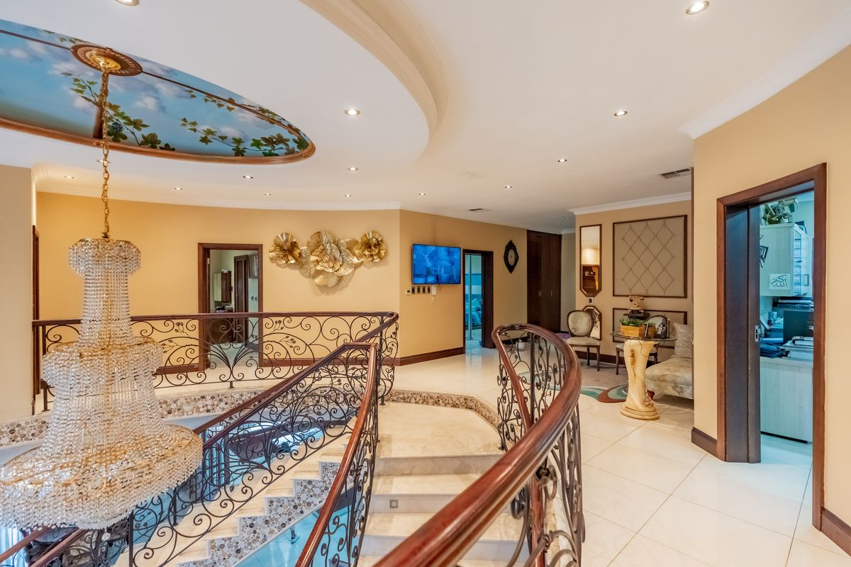 A CROWN JEWEL MANSION AWAITS ITS NEW ROYALTY! - Photo 2