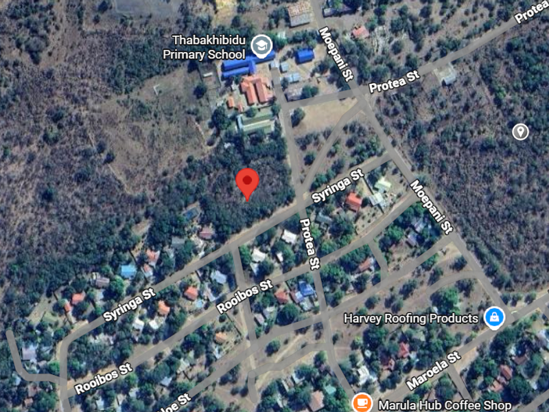 An aerial view showing the location of the vacant residential plot within the surrounding neighborhood and local infrastructure.