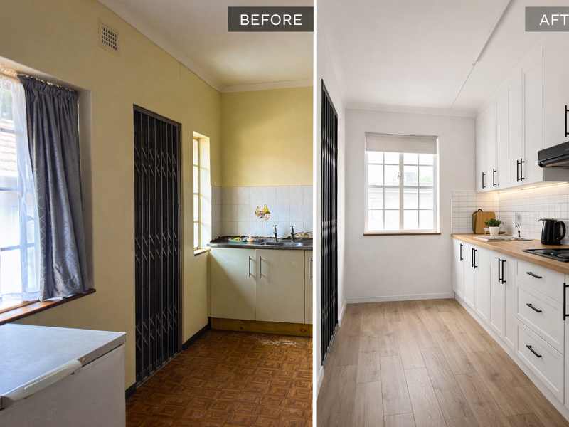 A modernised kitchen featuring white cabinetry, timber countertops, tiled splashbacks, and integrated appliances, showcasing a clean and functional design.