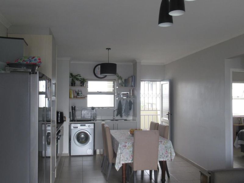 Modern First-Floor Apartment with Spacious Patio & Built-In Braai and Two Basement Parking bays - Photo 10