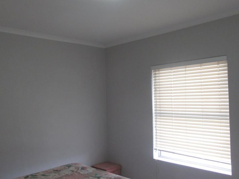 Modern First-Floor Apartment with Spacious Patio & Built-In Braai and Two Basement Parking bays - Photo 8