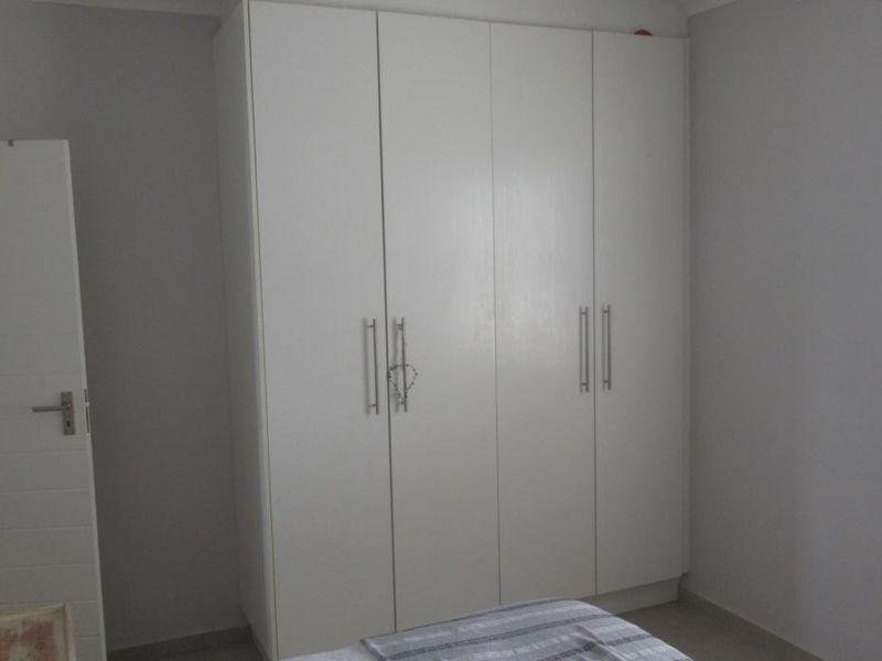 Modern First-Floor Apartment with Spacious Patio & Built-In Braai and Two Basement Parking bays - Photo 6