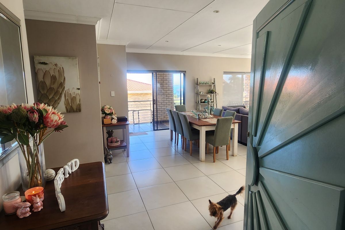 Versatile double-storey home with sea views and exceptional income potential. - Photo 2