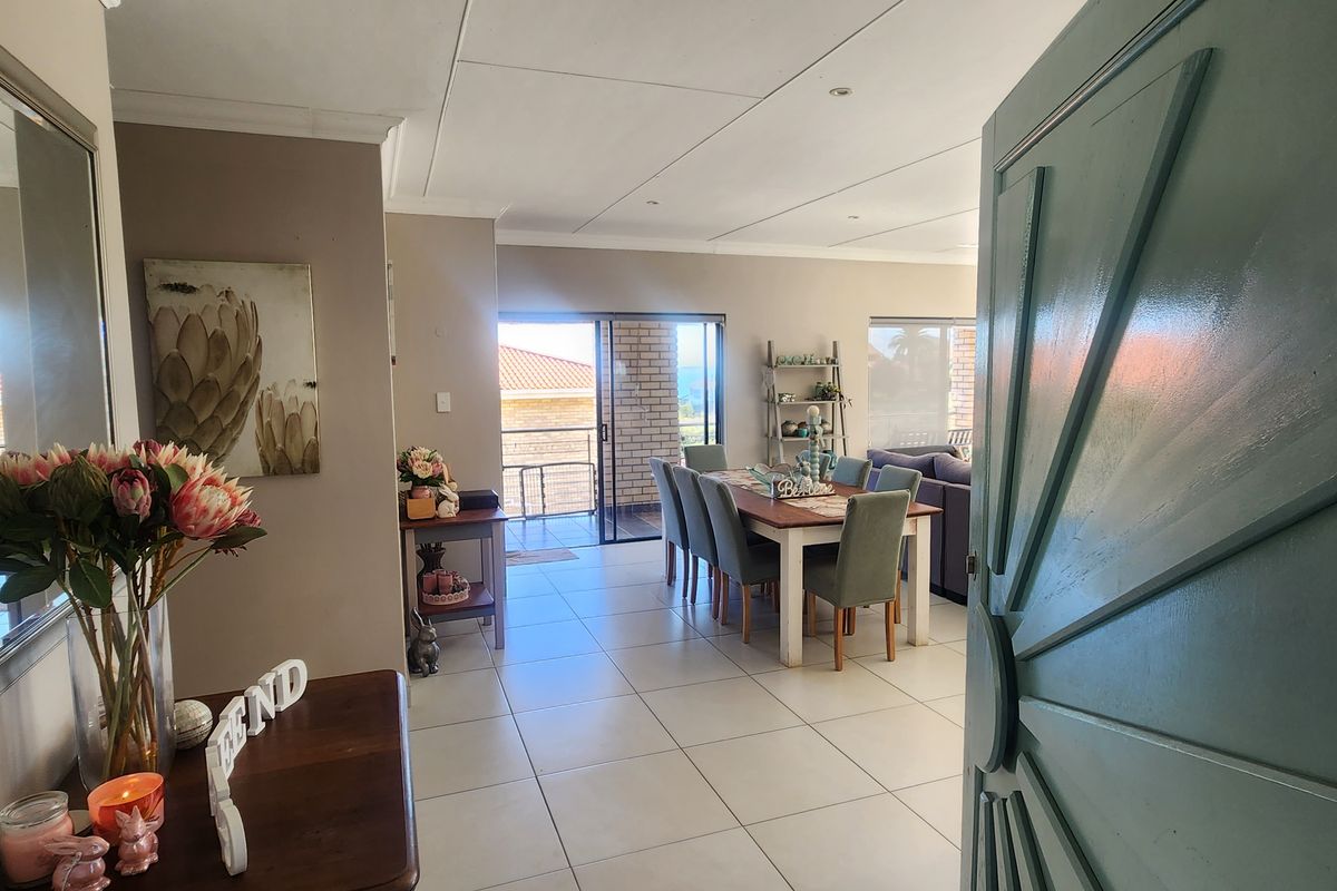 Versatile double-storey home with sea views and exceptional income potential. - Photo 3