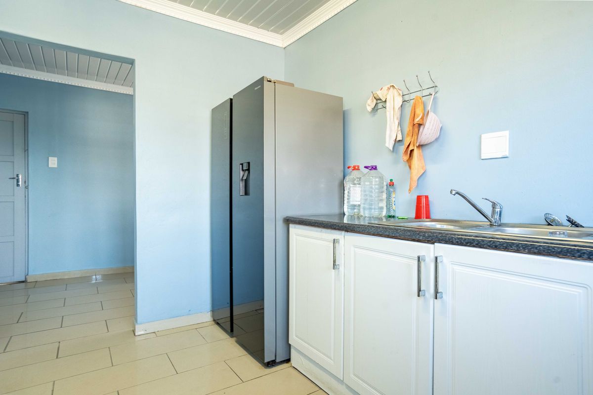 Well-Located Family Home Opposite High School in Lovu A Section - Photo 5