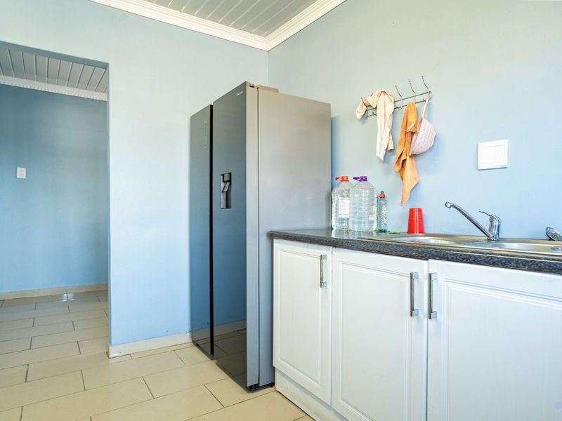 Well-Located Family Home Opposite High School in Lovu A Section - Photo 5