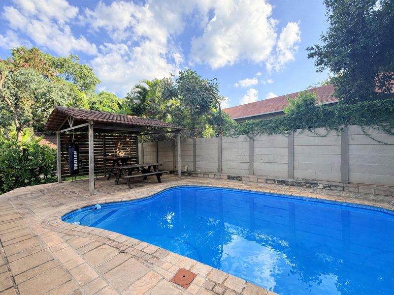 Elegant Five-Bedroom Family Retreat in Sought-After Protea Park - Photo 7