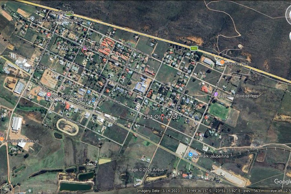 An aerial satellite view of the residential area in Joubertina, showing the surrounding landscape and street layout.