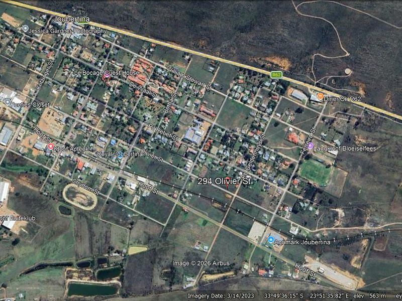 An aerial satellite view of the residential area in Joubertina, showing the surrounding landscape and street layout.