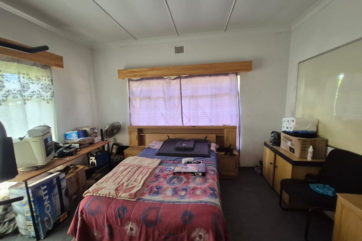 Calling all home renovators! This property is full of potential and needs some TLC. - Photo 3