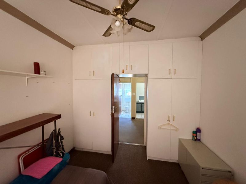 Well-Maintained 3 bedroom Home with Pool & Income-Generating Flatlet - Photo 3