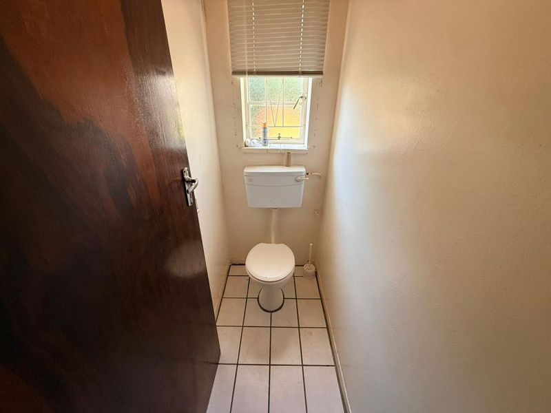 Well-Maintained 3 bedroom Home with Pool & Income-Generating Flatlet - Photo 10