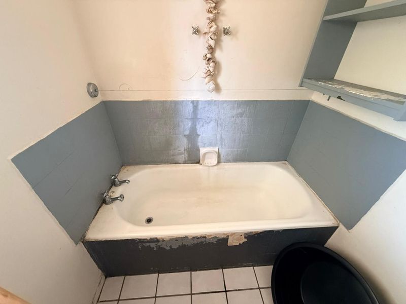 Well-Maintained 3 bedroom Home with Pool & Income-Generating Flatlet - Photo 9