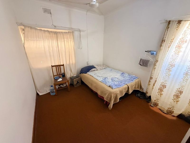 Well-Maintained 3 bedroom Home with Pool & Income-Generating Flatlet - Photo 7