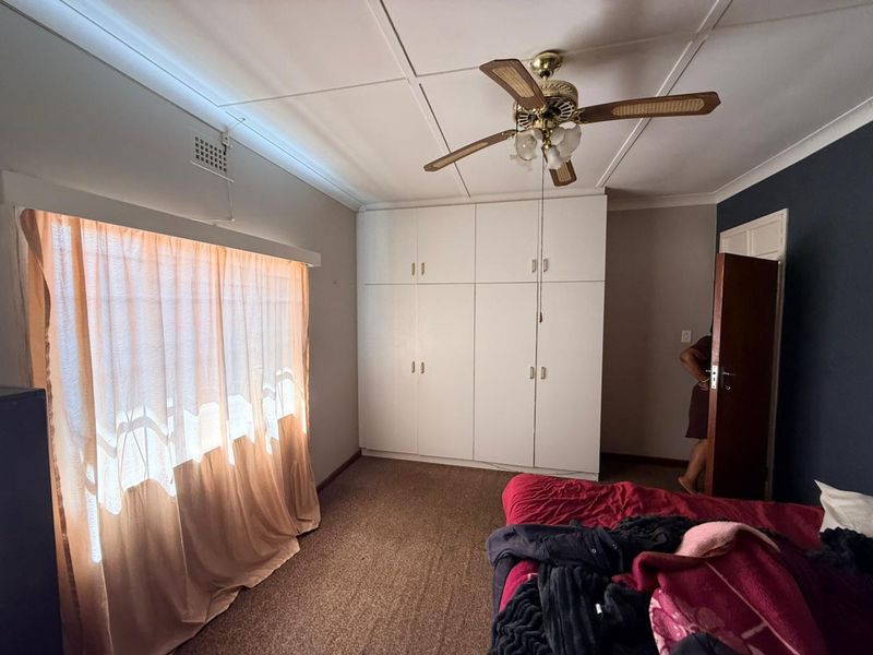 Well-Maintained 3 bedroom Home with Pool & Income-Generating Flatlet - Photo 6