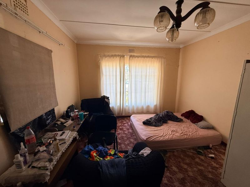 Well-Maintained 3 bedroom Home with Pool & Income-Generating Flatlet - Photo 5