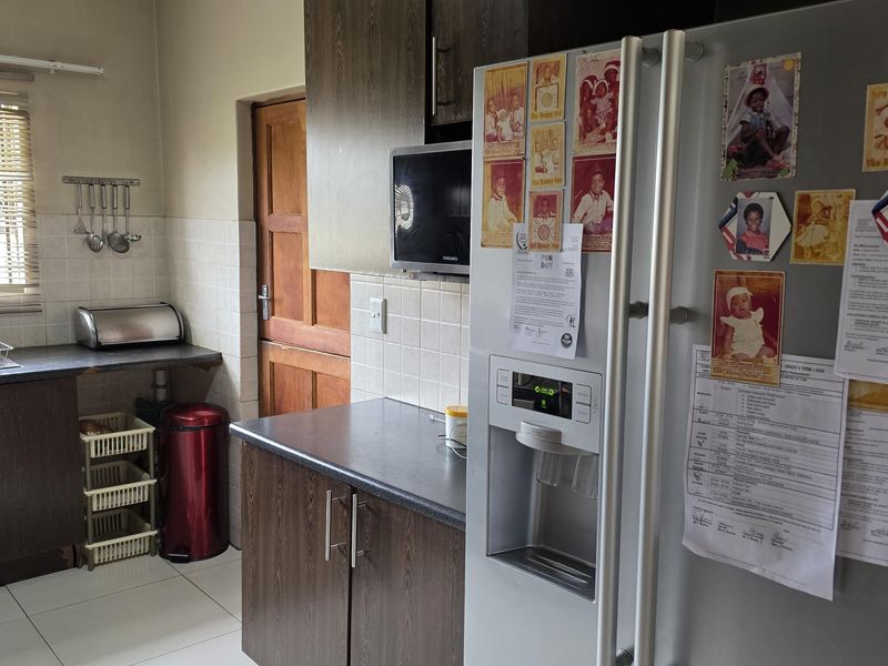 Modern Security Estate Living with Balconies, Built-in Braai & Airconditioning Throughout - Photo 4