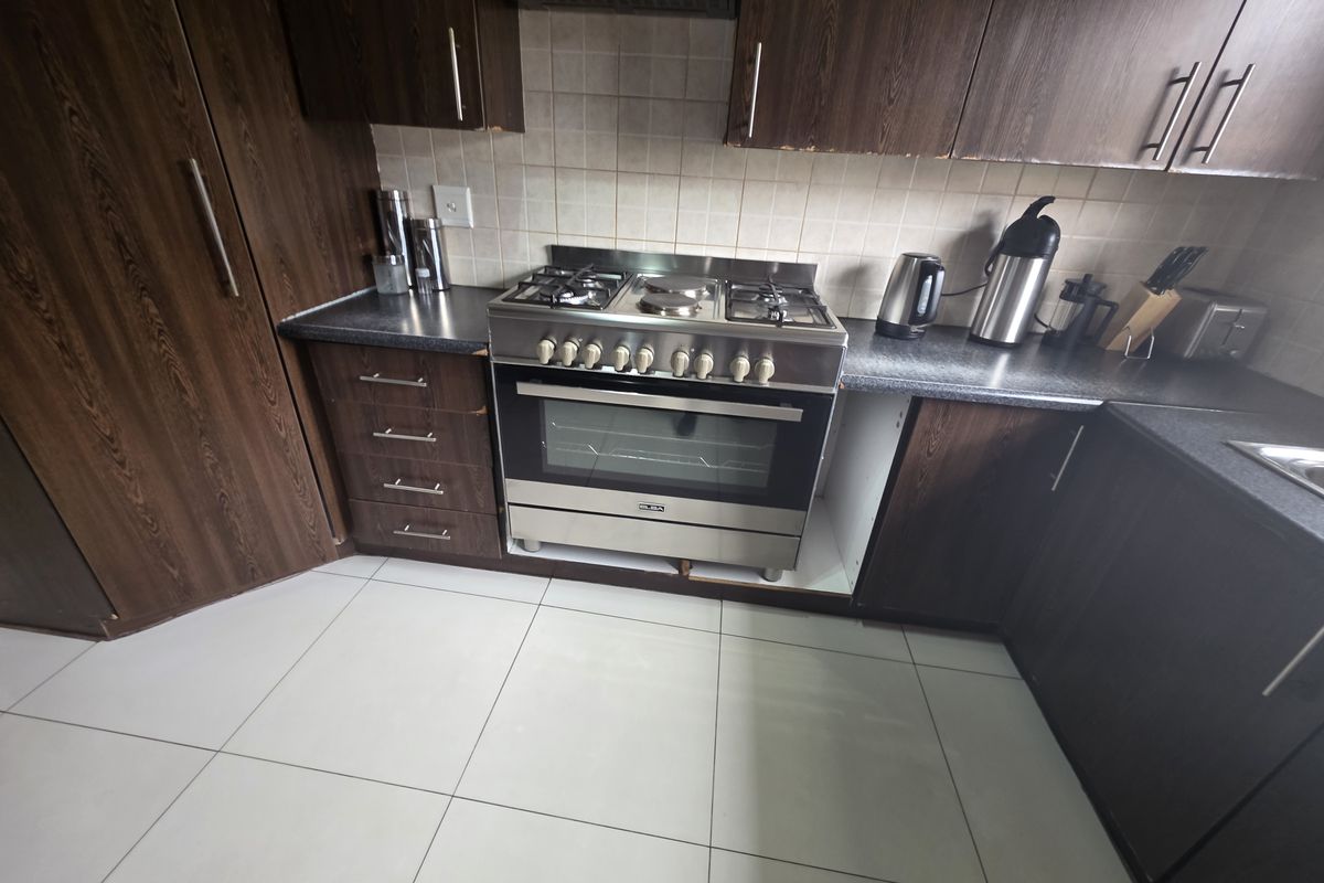 Modern Security Estate Living with Balconies, Built-in Braai & Airconditioning Throughout - Photo 2