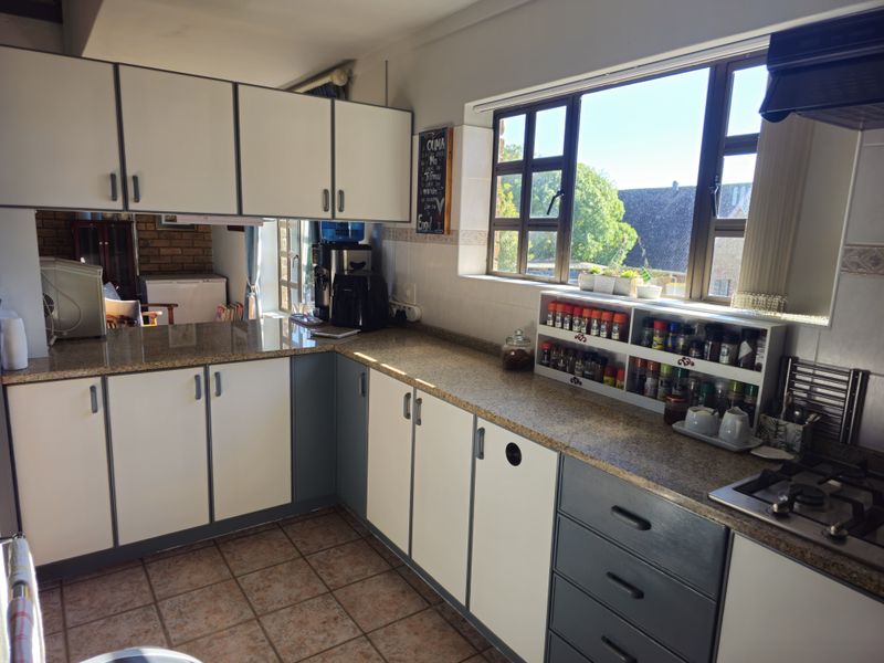 Elegant Coastal Retreat with Sweeping Stilbaai Views - Photo 6