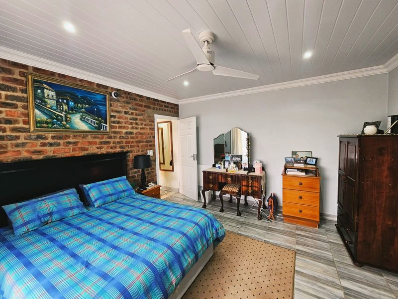 Coastal Comfort in a Secure, Peaceful Estate - Photo 10