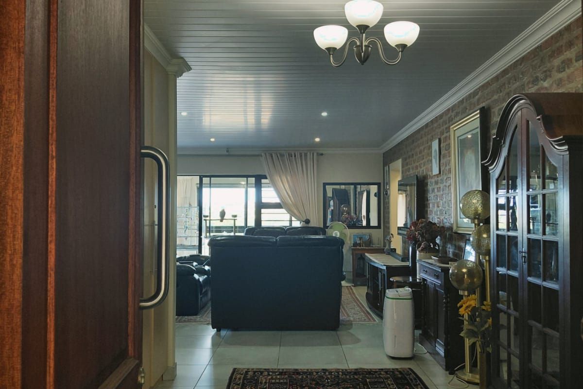 Coastal Comfort in a Secure, Peaceful Estate - Photo 2