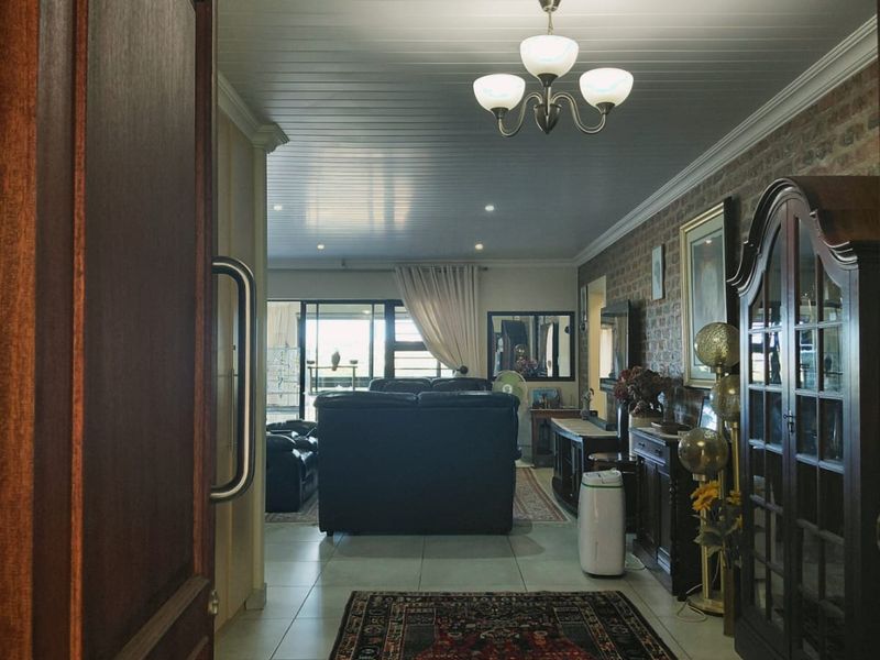 Coastal Comfort in a Secure, Peaceful Estate - Photo 2