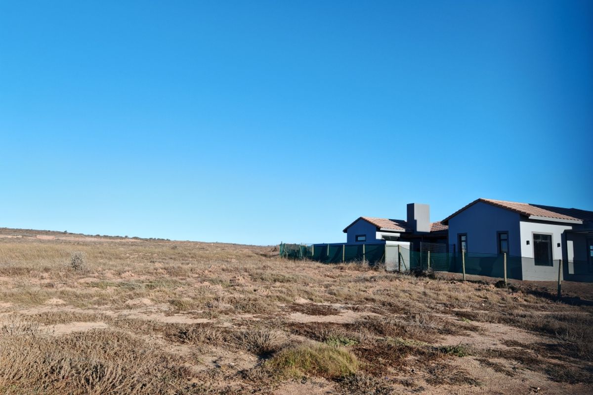 Secure Estate Living with Coastal Appeal - Photo 2