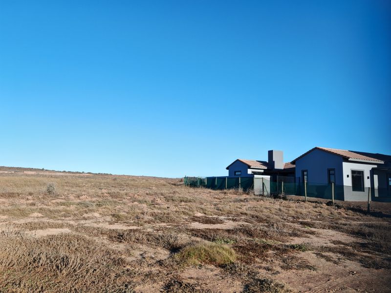 Secure Estate Living with Coastal Appeal - Photo 2