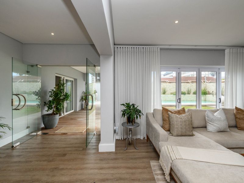 Beachfront Living at Its Finest – A True Coastal Masterpiece - Photo 9