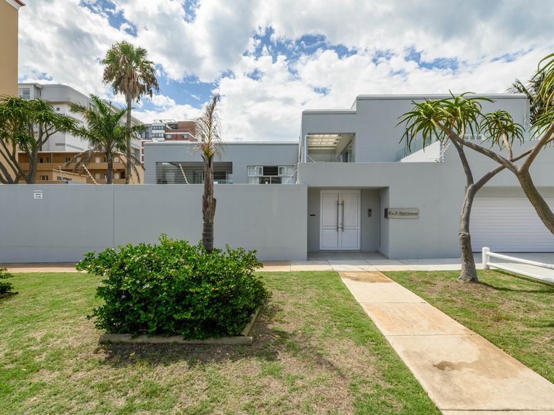 Beachfront Living at Its Finest – A True Coastal Masterpiece - Photo 7