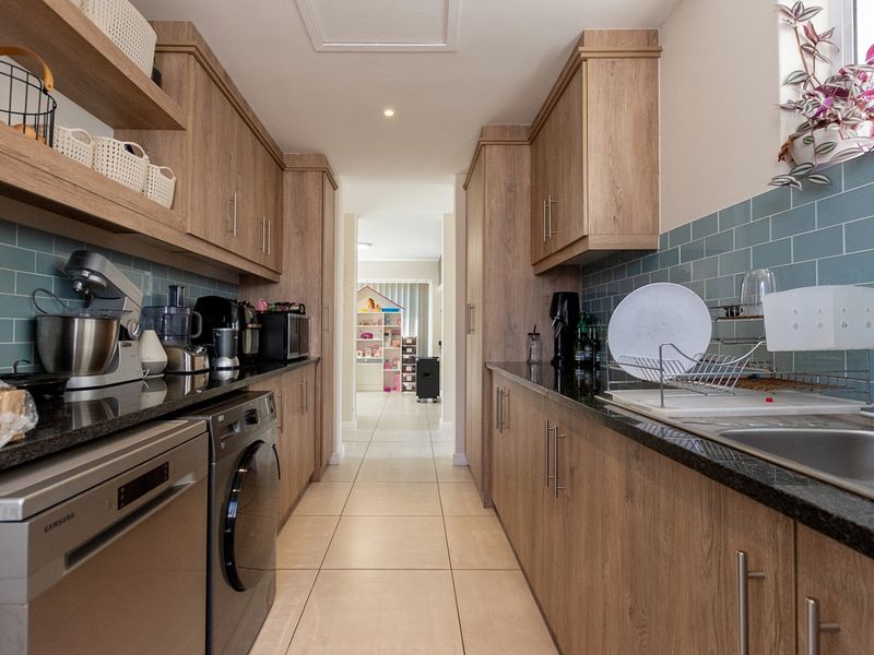 Elegant Family Living with West-Facing Entertaining and Northern Greenbelt Privacy - Photo 6