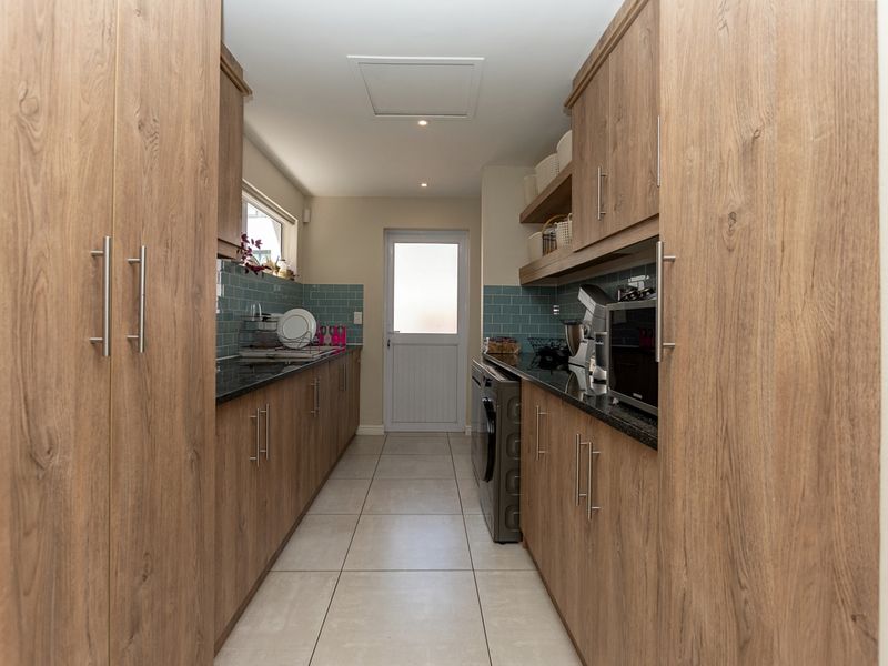 Elegant Family Living with West-Facing Entertaining and Northern Greenbelt Privacy - Photo 7