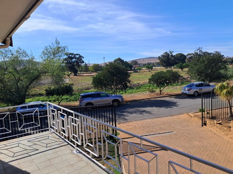 Elevated home with views and a proper sized braai and entertaiment room - Photo 5