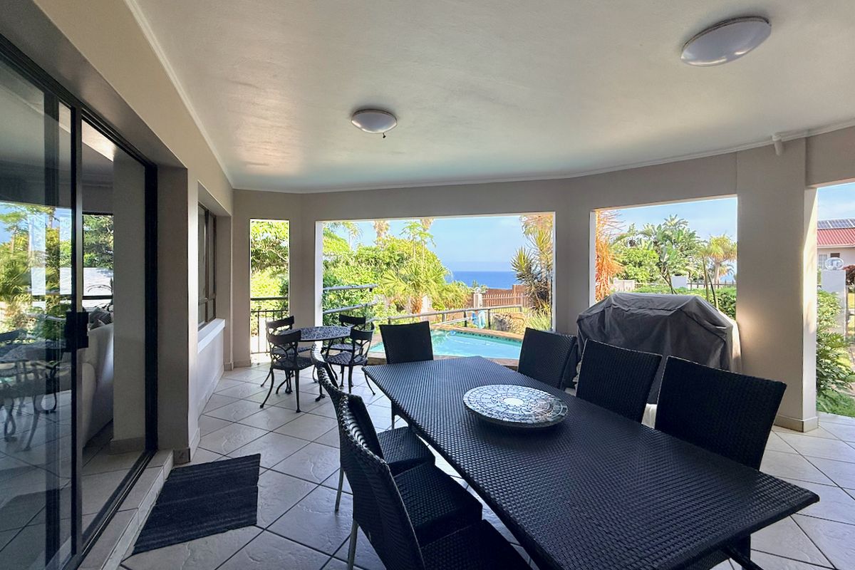 Elevated Coastal Living with Panoramic Sea Views - Photo 4