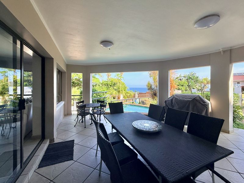 Elevated Coastal Living with Panoramic Sea Views - Photo 4