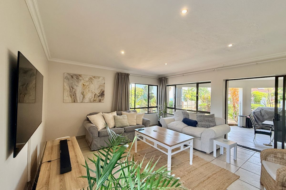 Elevated Coastal Living with Panoramic Sea Views - Photo 5