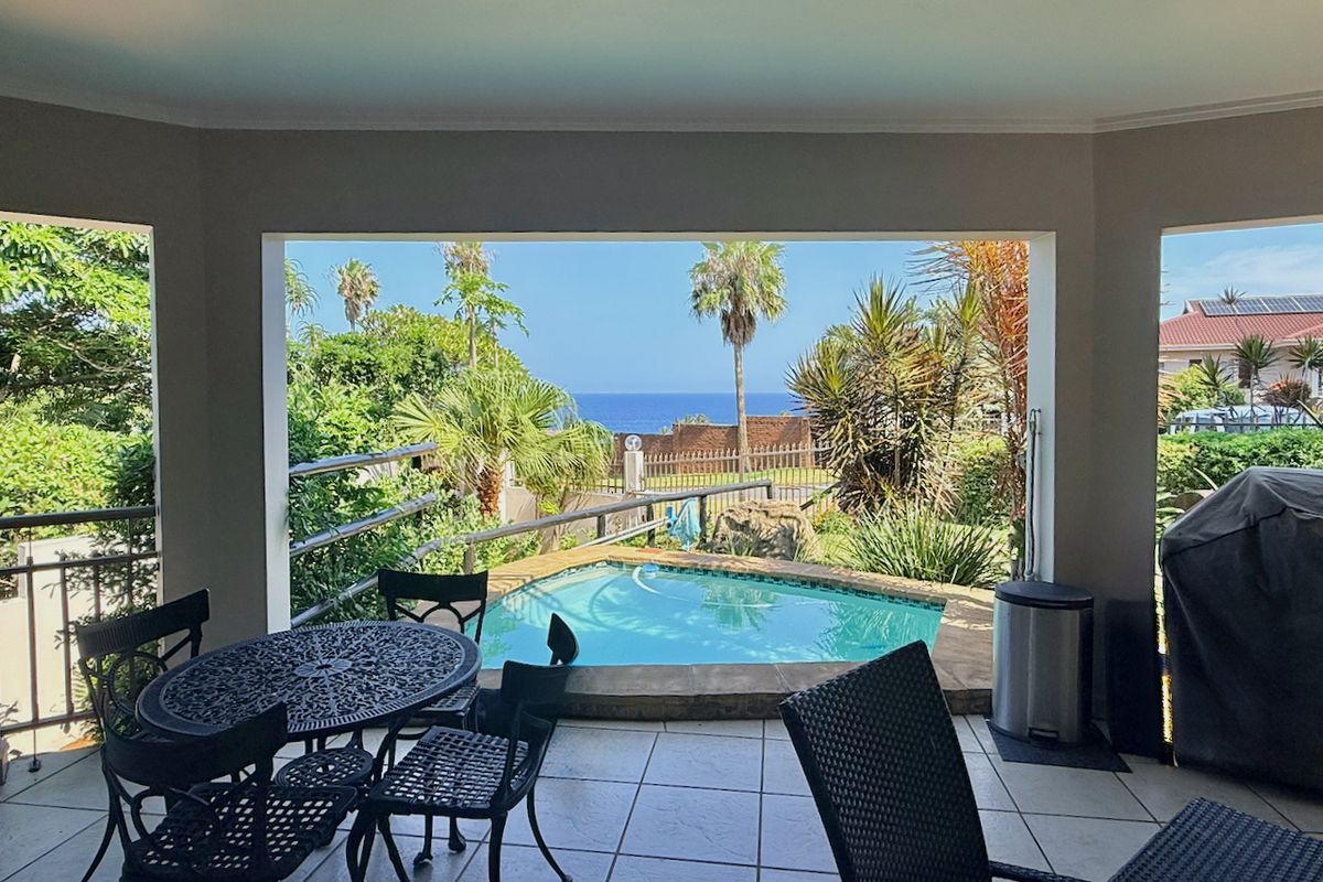 Elevated Coastal Living with Panoramic Sea Views - Photo 2