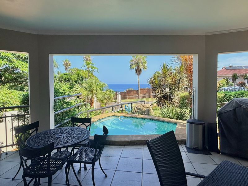 Elevated Coastal Living with Panoramic Sea Views - Photo 2