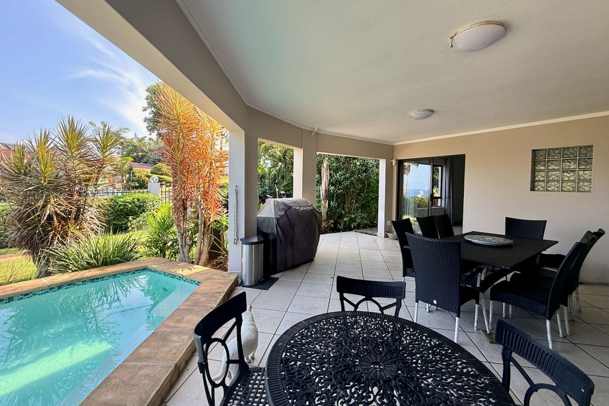 Elevated Coastal Living with Panoramic Sea Views - Photo 3