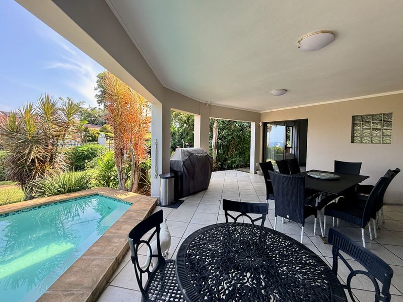 Elevated Coastal Living with Panoramic Sea Views - Photo 3