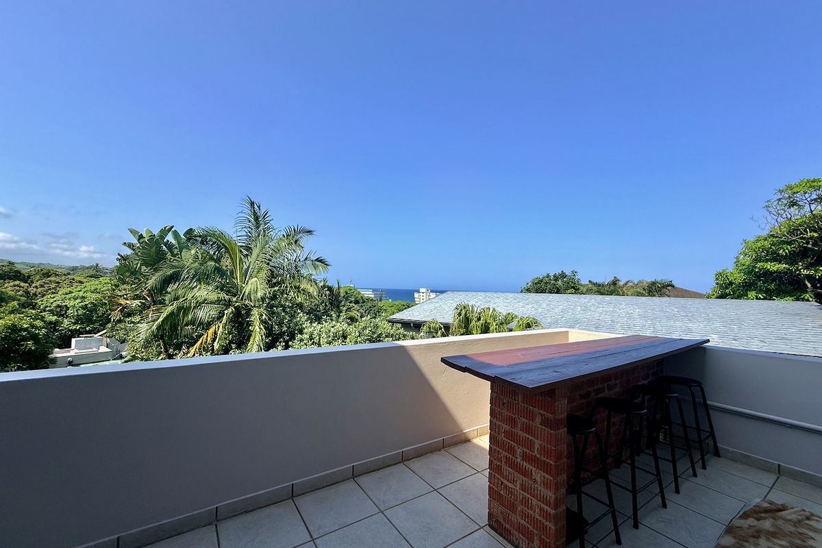 Elevated Coastal Living with Panoramic Sea Views - Photo 5