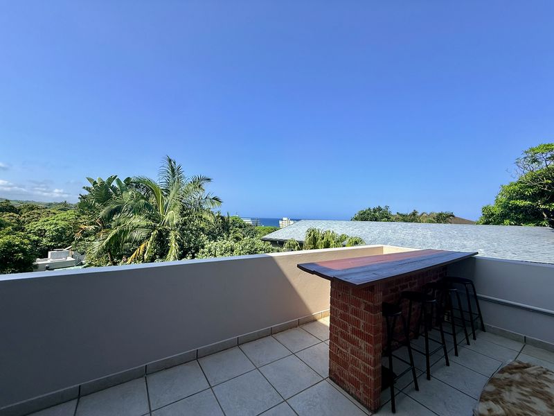 Elevated Coastal Living with Panoramic Sea Views - Photo 6