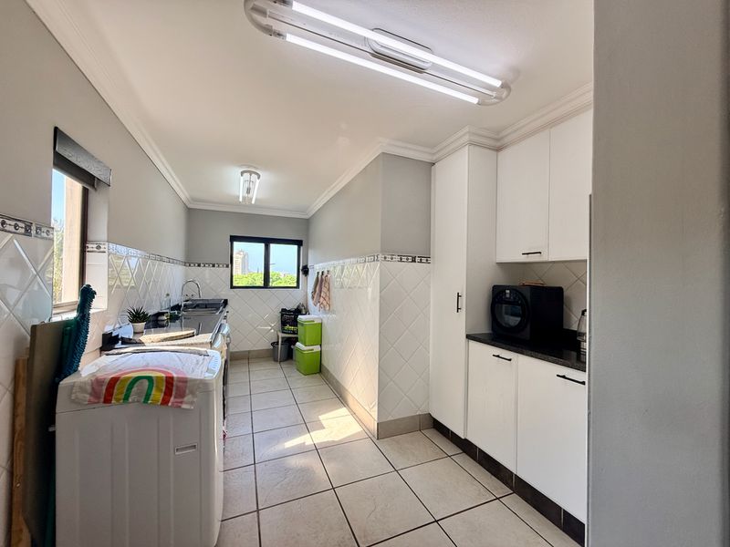 Elevated Coastal Living with Panoramic Sea Views - Photo 9