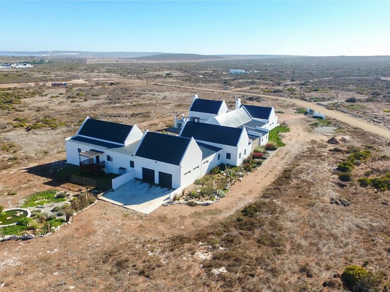 Exceptional Coastal Smallholding with Endless Potential and Panoramic Ocean Views - Photo 3