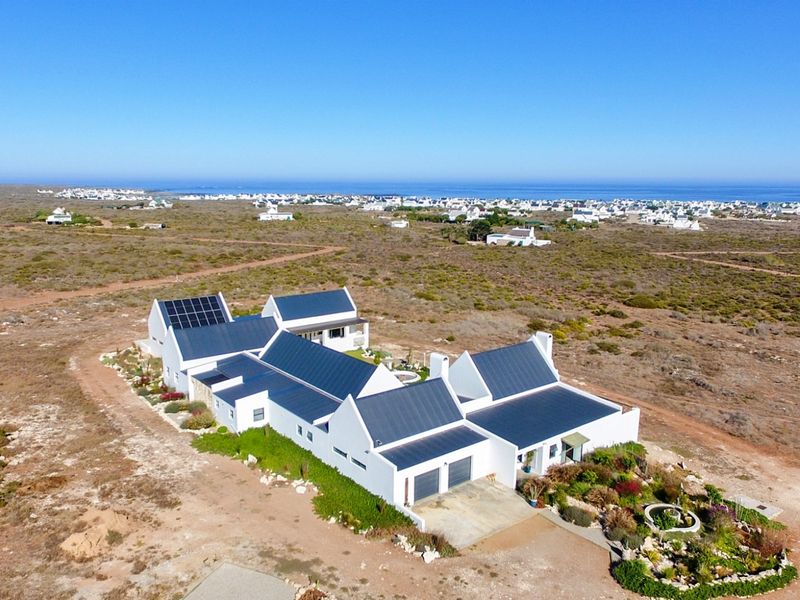 Exceptional Coastal Smallholding with Endless Potential and Panoramic Ocean Views - Photo 4